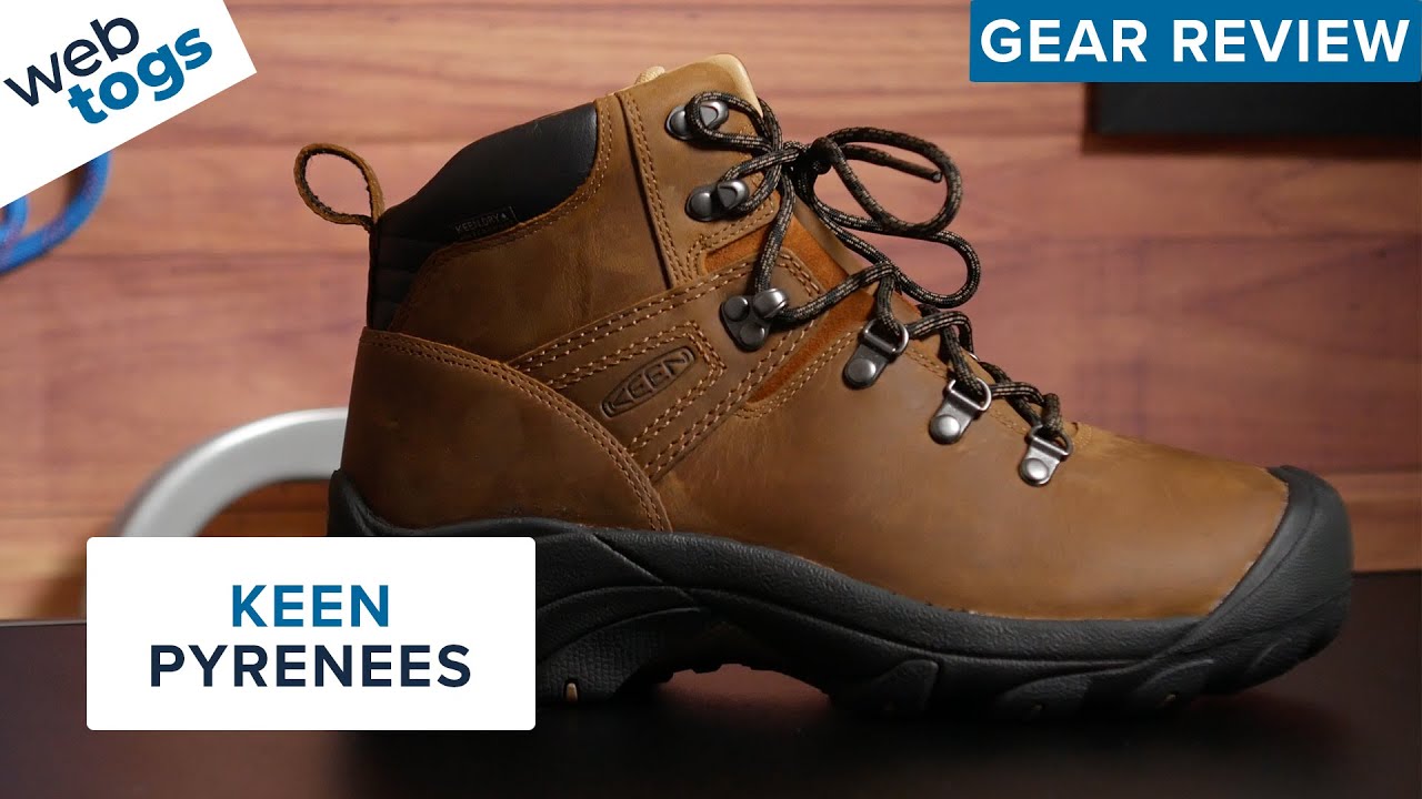 Standing at the edge of Whitsunday Island with boots covered in red dirt – here’s the honest take on Keen Hiking Boots!