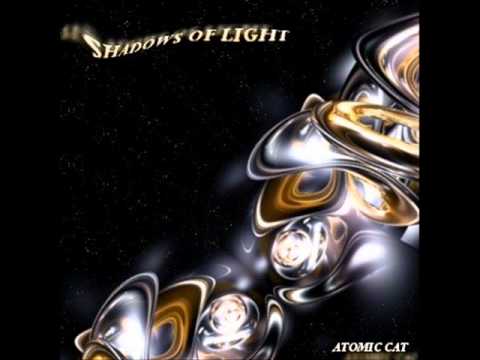 Atomic cat shadows of light