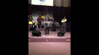Elder Courtney L. Sinclair preaching COGIC