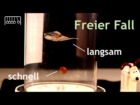 Free fall in a vacuum and under normal pressure