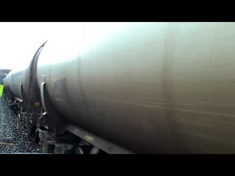 DB Shenker Class 60 099 with Jarrow - Lindsey tanks passing Heworth