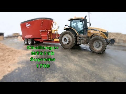 Feed mixer and Tractor. Challenger MT675D and Supreme 1700NT