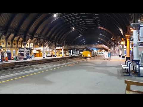 37610 + 37254 leave York with the Scarborough - Milford Loop test train. (08/02/21)