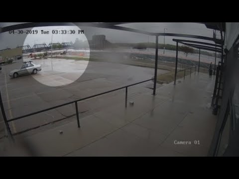 Surveillance video from a riverfront restaurant in Davenport, Iowa, captured the moment when a temporary barrier holding back the swollen Mississippi River broke, sending millions of gallons of floodwaters into downtown. (May 6)