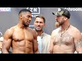 Anthony Joshua AGGRESSIVELY CHECKS Robert Helenius for the way he's looking at him during weigh in!