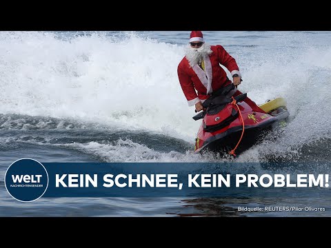 WEIHNACHTEN IN RIO:  Kein Schnee, kein Schlitten - Santa düst auf Jetski durch die Copacabana!