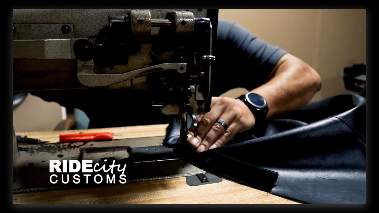 Ride City Customs promo video thumbnail showing the shop floor