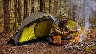 Camping in rain with Campfire Next to River With My Dog