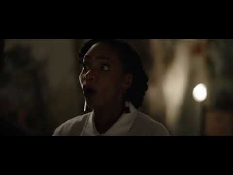 Candyman 2021 official trailer still with silhouetted hook and foggy Chicago skyline