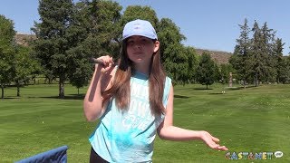 Emma tees off