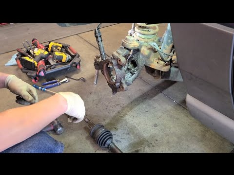 1999 - 2004 Jeep Grand Cherokee 4.0l Driver front CV axle removal/replacement
