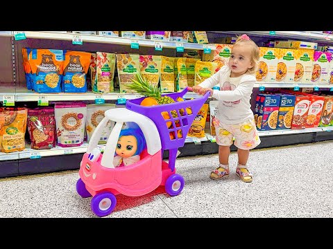 Alice and Baby doll doing shopping in the supermarket