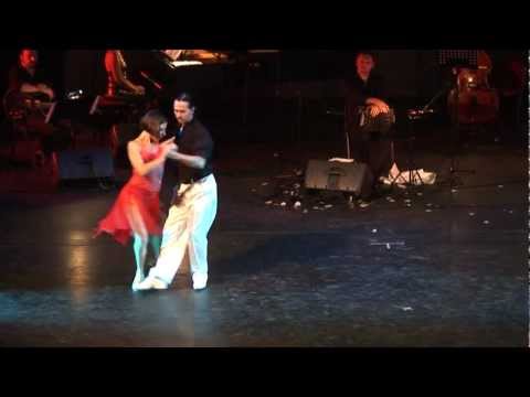  Gisela Natoli  and  Gustavo Rosas  are  dancing  to  a  nontraditional song  at  Aix Tango Festival  in  2012