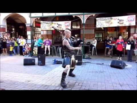 Impressive Scottsman Playing ACDC on flaming bagpipes