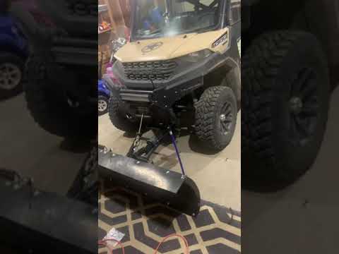 Installing power angle on a Polaris Ranger snowplow on a budget