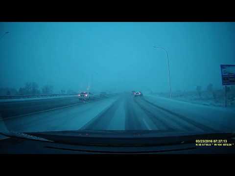 Colorado Springs car crash spinout during the ice and snow on I-25 highway.