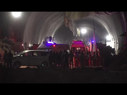 Ambulances leave tunnel entrance after Indian workers rescued | AFP