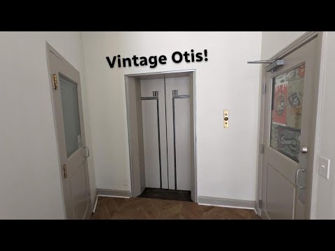 Vintage Otis black button traction elevator at 404 9th St in Huntington WV