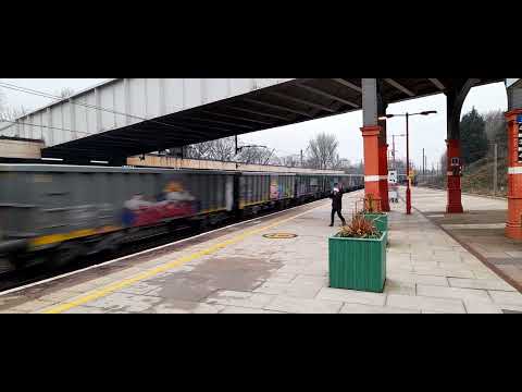 A train spotter enjoying 6h51 Hardendale to Tunstead passing by.