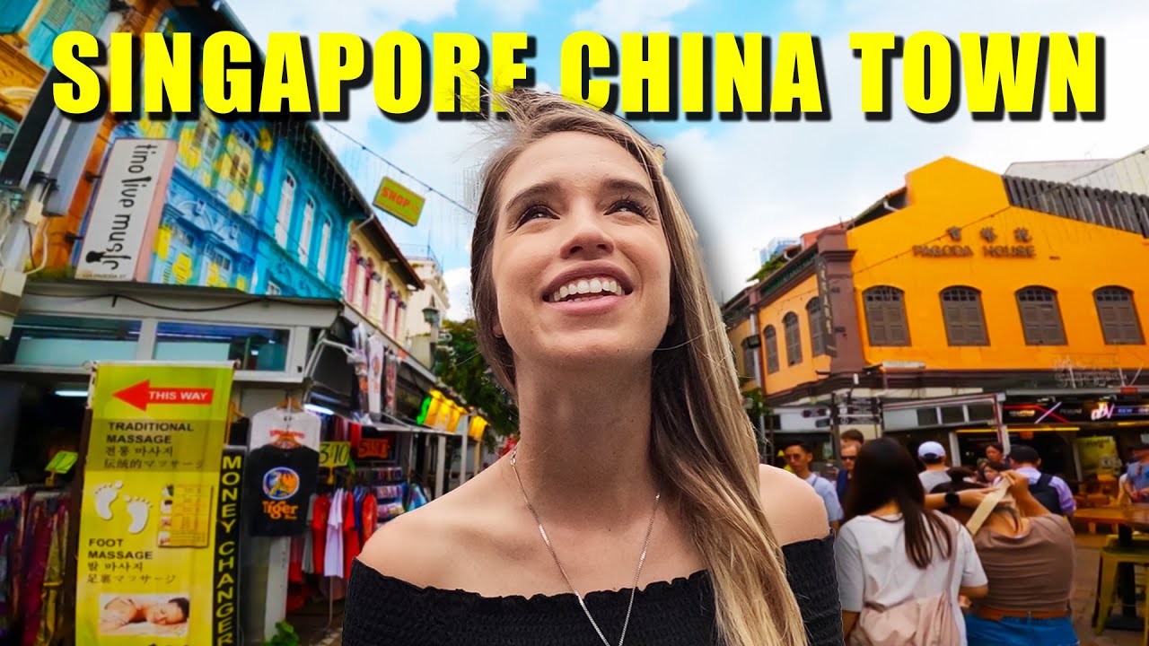 Join travelers as they explore Singapore's vibrant Chinatown in this captivating video.