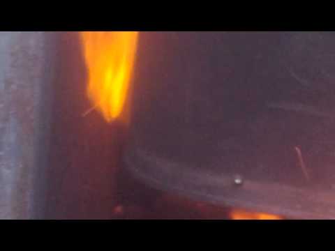 Charcoal retort in stove