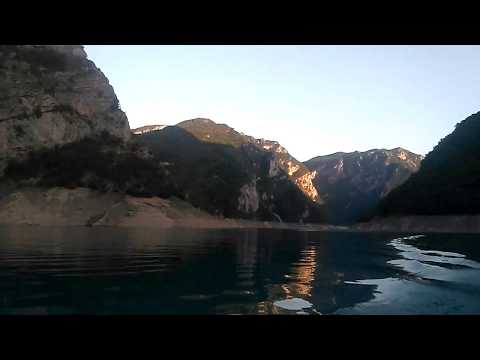 Piva lake / guides cruising with friends / Summer Evening Montenegro Canyon Mountains