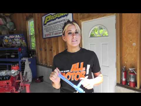 Stephanie quickly checks her valve spring seat pressure