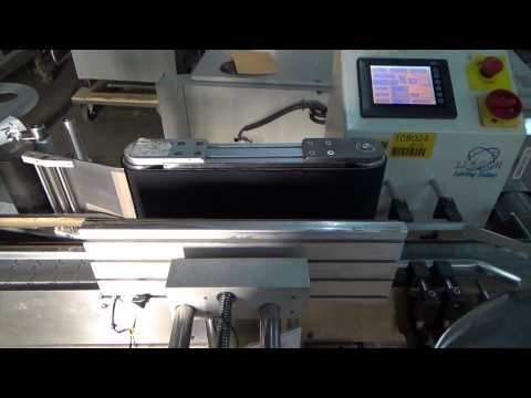 Used- Pack Leader Machinery Model PL-511 Wrap Around Automatic Labeling Machine - stock # 70916003