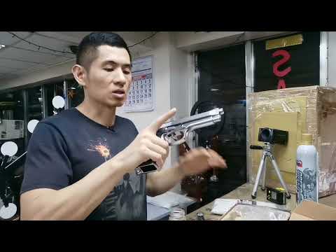 Testing the WE Beretta M92 Silver Airsoft gas blowback pistol before shipping.
