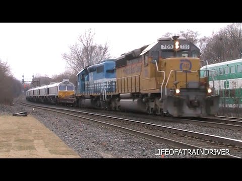 00128 FEC and GSCX SD40-2's Transport 8 Euro Cargo Rail Locomotives for Export from EMD London, ON