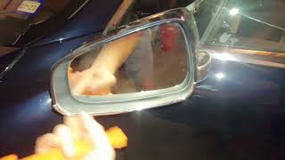 How to check the auto-dimming mirrors on 2013 Tesla Model S