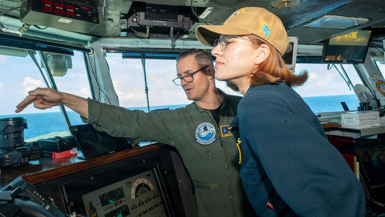 What does a Navy Assistant Navigator on a Nimitz Class Aircraft Carrier do?