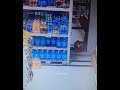 Bottle falls of the shelf but shoots itself back immediately