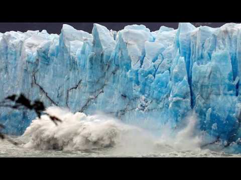 calving Perito Moreno glacier in Argentina is growing,  big sheets of ice fall off Patagonia glacier