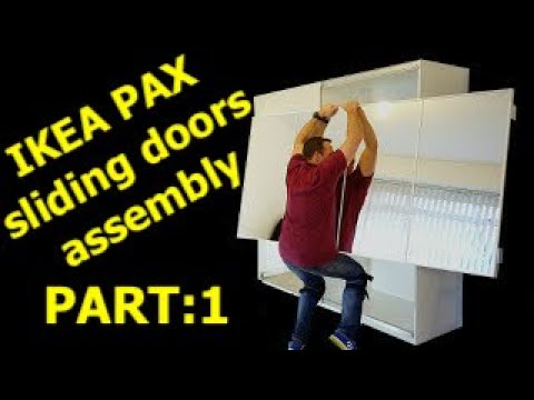 Part of a video titled IKEA PAX WARDROBE Sliding doors assembly (Part 1) - YouTube