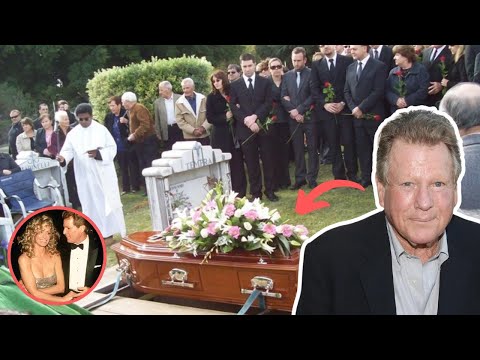 Ryan O’Neal buried next to his longtime love Farrah Fawcett 2 weeks after his death