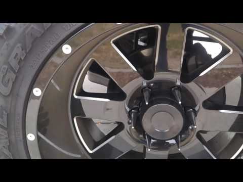 Black steel center caps for aftermarket wheels.