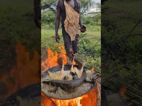 Chaba cooking traditional food in the wild