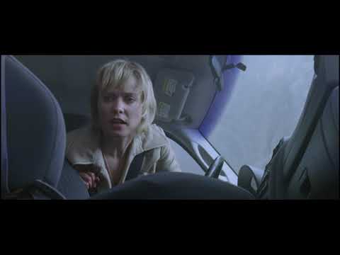Trailer beat: Rose in flashlight cone while ash falls, score droning