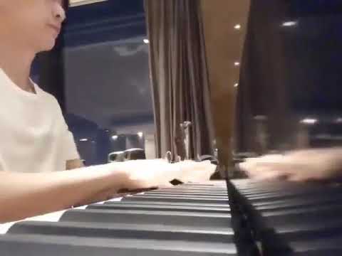 Yixing Playing Piano