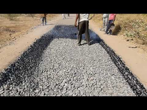 MPM Modified Penetration macadam by hand method on village Road
