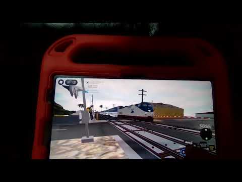 Amtrak #592 with P42 #117 arriving and departing with its solid horn and Cabcar #6904 at back