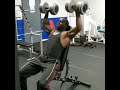 Savage Muscle God pressing 90 lbs dumbells