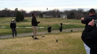 preview picture of video 'National Golf Club Pro hits first drive of 2013 off of Champagne bottle'