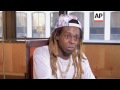 Lil Wayne stands by his 'no such thing as racism' comment.