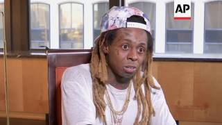 Lil Wayne stands by his &#39;no such thing as racism&#39; comment.