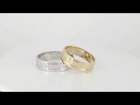 A video of 14k Gold Hammered and Smooth Finish Wedding Ring