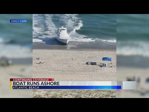 Witnesses capture video, photos of moment boat runs ashore in Atlantic Beach