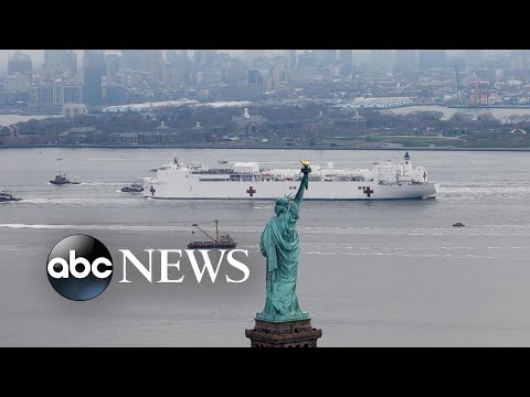 USNS Comfort, food lines, goats roam the streets: The Week in Photos