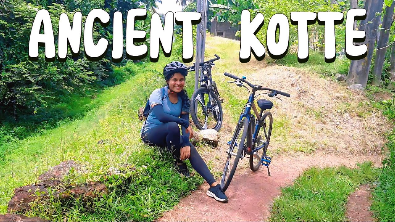 Travelers explore Kotte Ancient Ruins on a cycling tour.